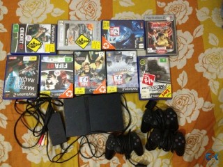 ps2 for with three controlers and 8 disc also all accesories