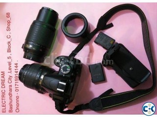 NIKON D 3100 WITH 18-55 mm and 55-200 mm Lens. Battery grip