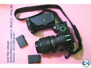 NIKON D3100 WITH 18-55mm Lens. Battery grip , two battery