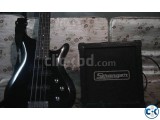 Crimson Bass Guitar and Stranger Amp