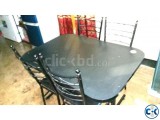Otobi Original Brand Dining Table with 4 chair black.