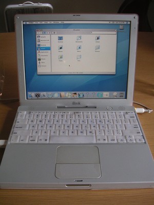 The iBook G3 500 Dual USB - Translucent White features a large image 1