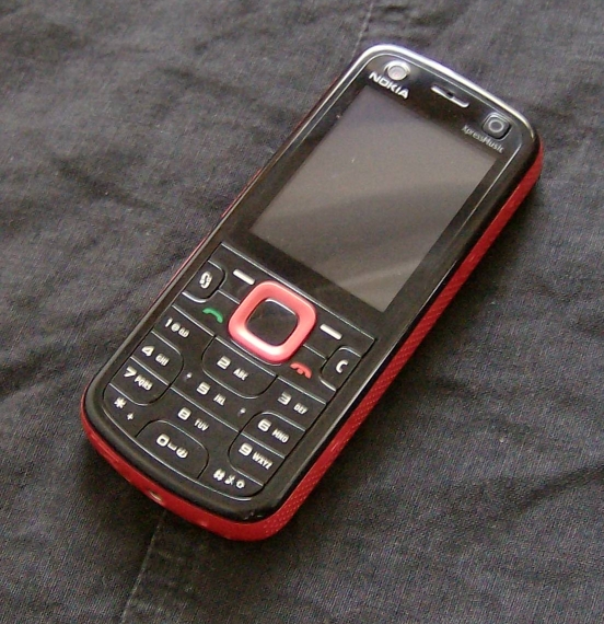 Nokia 5320 with headphn andcharger large image 0