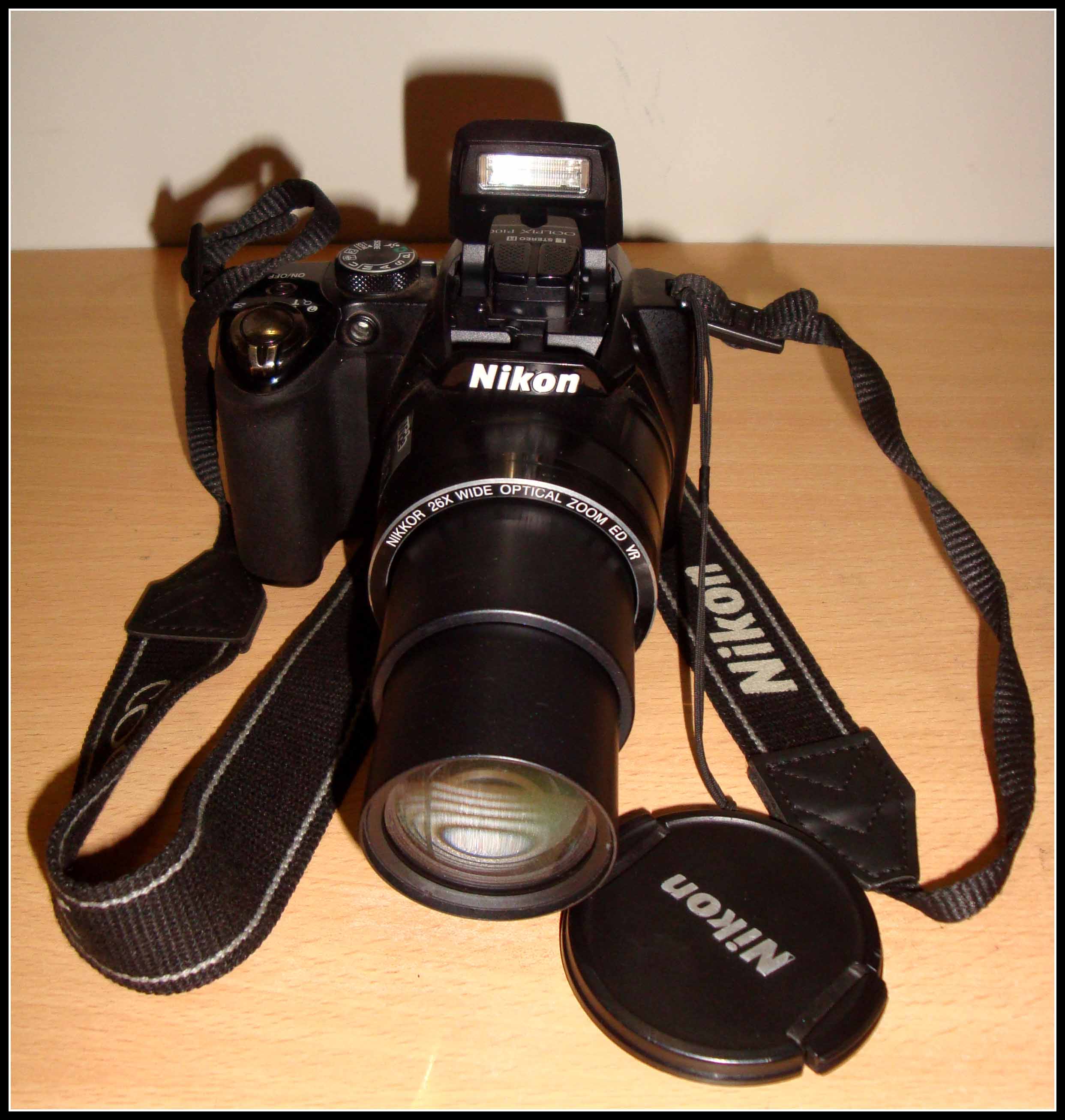 Nikon Collpix P100 with 26x zoom in cheapest rate. large image 0