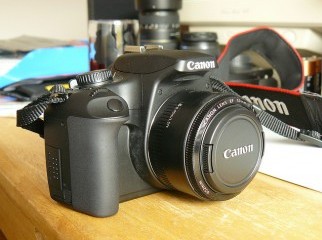 Canon 1000D DSLR with 50mm and 75-300mm lenses